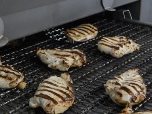 Chicken with grill marks coming out of a Marlen Infrared Grill